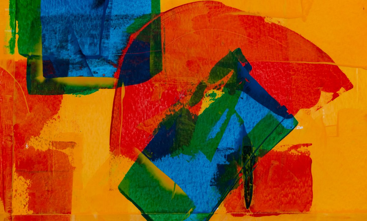 抽象艺术的照片，包括橙色，蓝色，绿色和红色的油漆笔划。